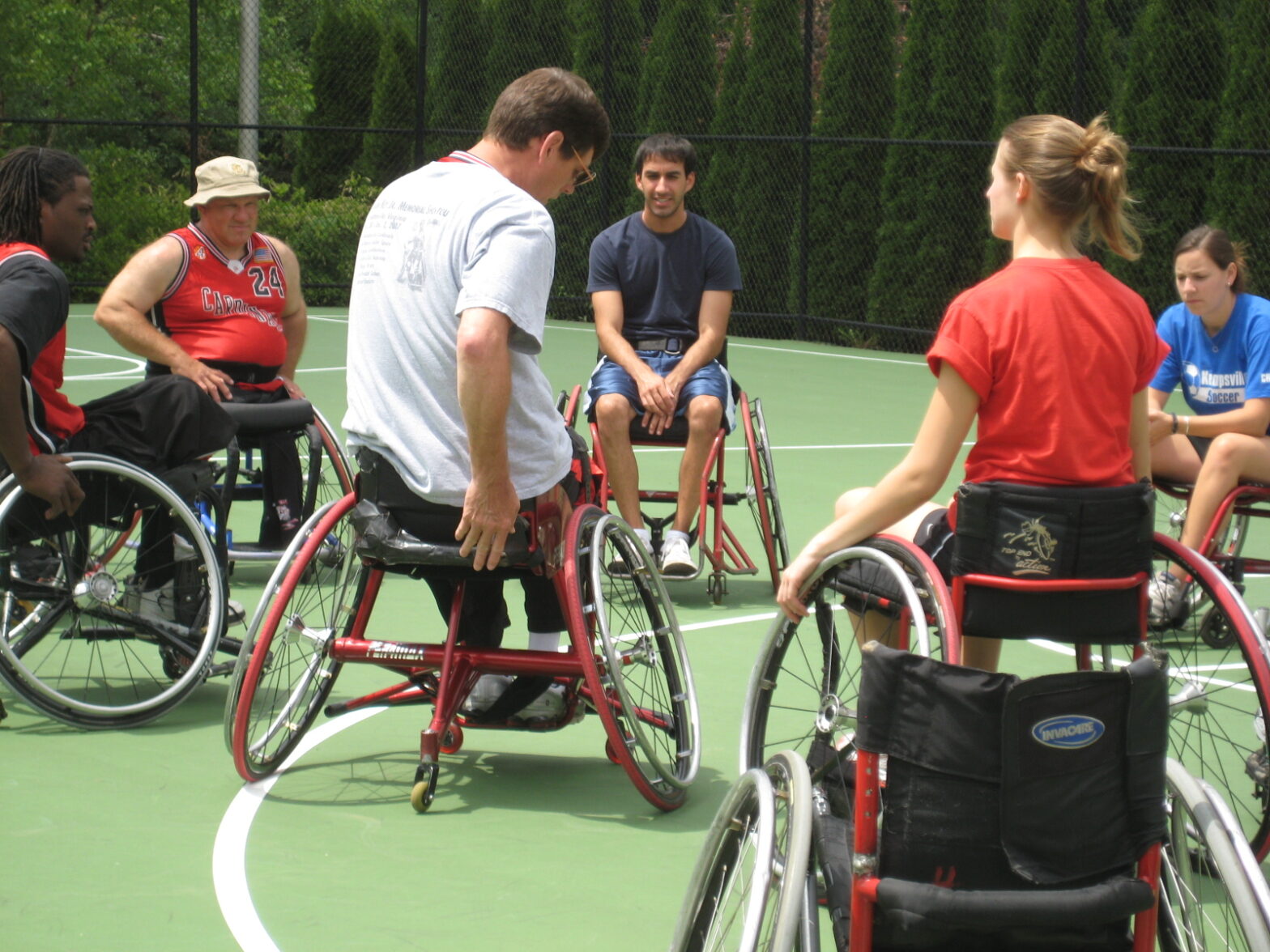 The Cardinals wheelchair basketball team trains UVA graduate students in sport wheelchair usage
